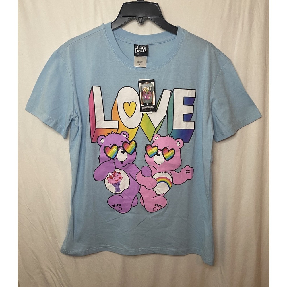 CARE BEARS JUNIORS WOMENS BEAR T SHIRT Size L LT Blue